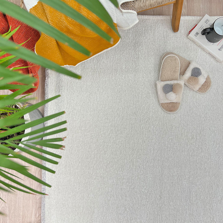 Tapis lavables blancs unis