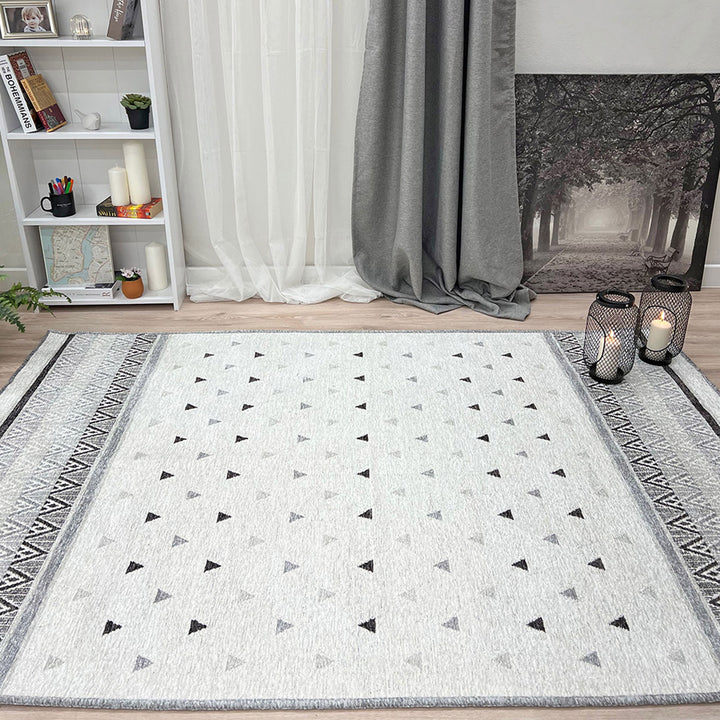 Tapis lavable tissé triangulaire gris et blanc cassé