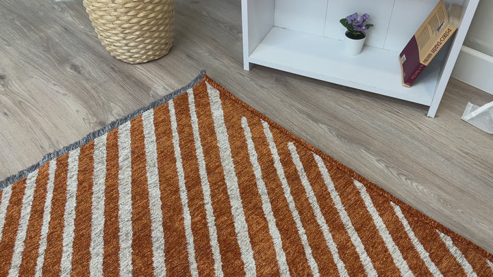 Tapis tissé lavable géométrique orange brûlé et crème