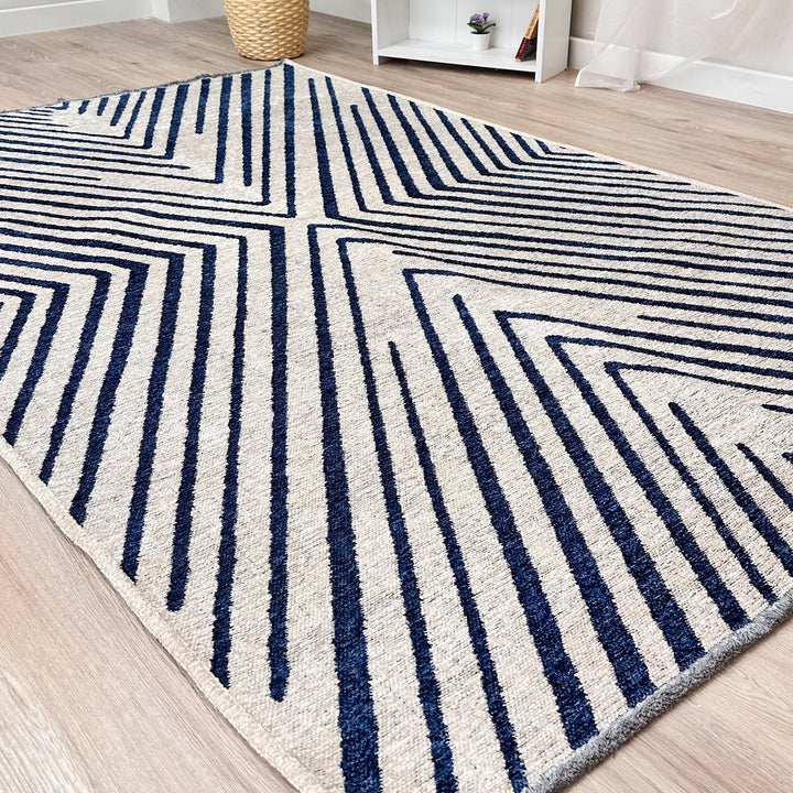 Alfa Rich cream navy blue area rugs are cotton, pet friendly, easy to clean, foldable and machine washable, but we recommend laundromat for large sizes! It is woven. It is odorless and lint-free. It is antibacterial and antiallergic. Alfa Rich area rugs have a low pile (0.50 inches). But wait, there's more! We're also offering FREE SHIPPING, making it even easier for you to bring a touch of timeless charm into your home.